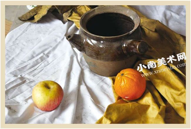 罐子与苹果、橙子组合实物照片